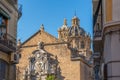 View of the building of the Basilica of Saints Justus and Pastor with street view, Granada, Andalusia, Spain Royalty Free Stock Photo