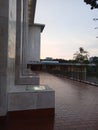 view of the building in the evening with the evening sky in the ba ckground