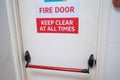 View of a building fire rated door with the sign to \