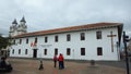 View of the building of the Prefecture of Azuay located in front of the park San Blas Royalty Free Stock Photo