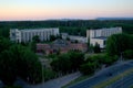 View of the building of the sanatorium and the unfinished hydropathic center on the background of the forest. Royalty Free Stock Photo