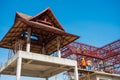 View of building and worker at construction site