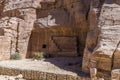 A view of burial sites close to the path in the ancient city of Petra, Jordan Royalty Free Stock Photo