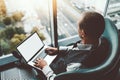 Man entrepreneur on armchair, laptop