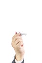 View of a businessmans hand with an airplane. Travel concept