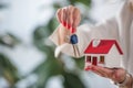 View of businesswoman showing house model Royalty Free Stock Photo