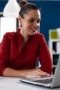 View of businesswoman typing on laptop and using touchped Royalty Free Stock Photo