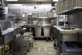 a view of a busy kitchen, with dishwashers and cleaning stations in full operation