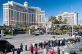 view of a busy street near the Belagio Hotel in Las Vegas with hotels and tourists on a sunny day. Nevada, USA