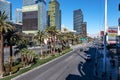 view of a busy street outside the Belagio Hotel in Las Vegas with hotels and traffic on a sunny day. Nevada, USA