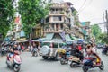 View of busy traffic in an intersection with many motorbikes and vehicles in Hanoi Old Quarter, capital of Vietnam. Royalty Free Stock Photo