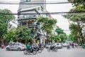 View of busy traffic with motorbikes and vehicles in Hanoi Old Quarter, capital of Vietnam. Royalty Free Stock Photo