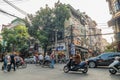 View of busy traffic with motorbikes and vehicles in Hanoi Old Quarter, capital of Vietnam. Royalty Free Stock Photo