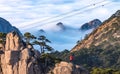 View of the cable car and photographer from the view point of the top of Huangshan Mountain or Yellow mountain in the winter Royalty Free Stock Photo