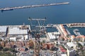 View of a cable car pylon with Gibraltar harbour in the background