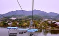 View of cable cars crossing the lake