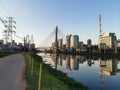 View of the cable-stayed bridge of the marginal cycle lane at sunset