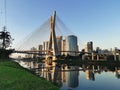 View of the cable-stayed bridge of the marginal cycle lane at sunset