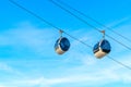 View of cableway gondola cable car on blue sky background