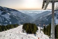 View from cableway on slope and skiers in resort Chopok Juh, Slovakia