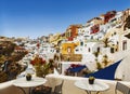 View of the cafe and the city of Fira on a Sunny summer day. Santorini