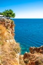 View of a cafÃÂ© at Mediterranean seacoast cliff and beach near A