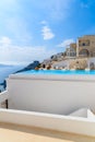 A view of caldera with luxury hotel buildings, typical white architecture of Imerovigli village on Santorini island, Greece Royalty Free Stock Photo