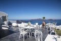 View of the Caldera from the terrace cafe, Fira, Santorini Royalty Free Stock Photo