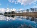 The view of the calm lake, the blue sky Royalty Free Stock Photo