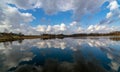 the view of the calm lake, the blue sky Royalty Free Stock Photo