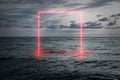 View of the calm sea in the evening, a neon frame emerging from the water, futuristic background Royalty Free Stock Photo