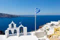 View on calm sea surface through traditional Greek white church arch Royalty Free Stock Photo