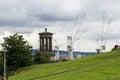 View from Calton hill with ugald steward Monument to the old town of Edinburgh with building cranes Royalty Free Stock Photo