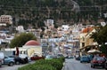 A view of Calymnos Island`s houses on the hill and road in front