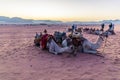 A view of camels resting in the desert landscape in Wadi Rum, Jordan just before sunrise Royalty Free Stock Photo