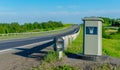 View camera fixing the movement of cars from speeding on the road Royalty Free Stock Photo