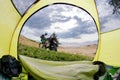 View from camp tent door on alone travel motorcycle bike