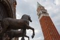 View of the Campanile and the statues of the horses of the San Marco Basilca