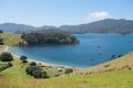 View of camping tents and boats from Urupukapuka Island in Bay o Royalty Free Stock Photo