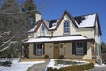 View of a Canadian Victorian style house with snow in winter Royalty Free Stock Photo