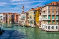 View of the canal with boats and gondolas in Venice, Italy. Venice is a popular tourist destination of Europe Royalty Free Stock Photo