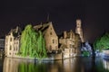 Beautiful canal and traditional houses at night in the old town of Bruges Brugge, Belgium Royalty Free Stock Photo