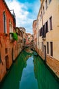 View on canal with gondola boat and motorboat water / river Royalty Free Stock Photo