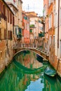 View on canal with gondola boat and motorboat water / river Royalty Free Stock Photo