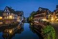 View of canal in little France district by night, Strasbourg, France