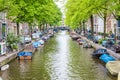 View of Canals, Houses and Boats in Amsterdam, Holland, Netherlands