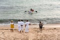 View of Candomble members delivering gifts to Iemanja, the queen of the sea, at Rio Vermelho beach