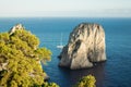 View of Capri's Faraglioni, natural rocks emerged from the sea.