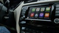View of car dashboard with all icons of Apple Computers CarPlay - Phone, music