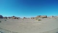 View of car driving in Yardang Landform Gansu, China.